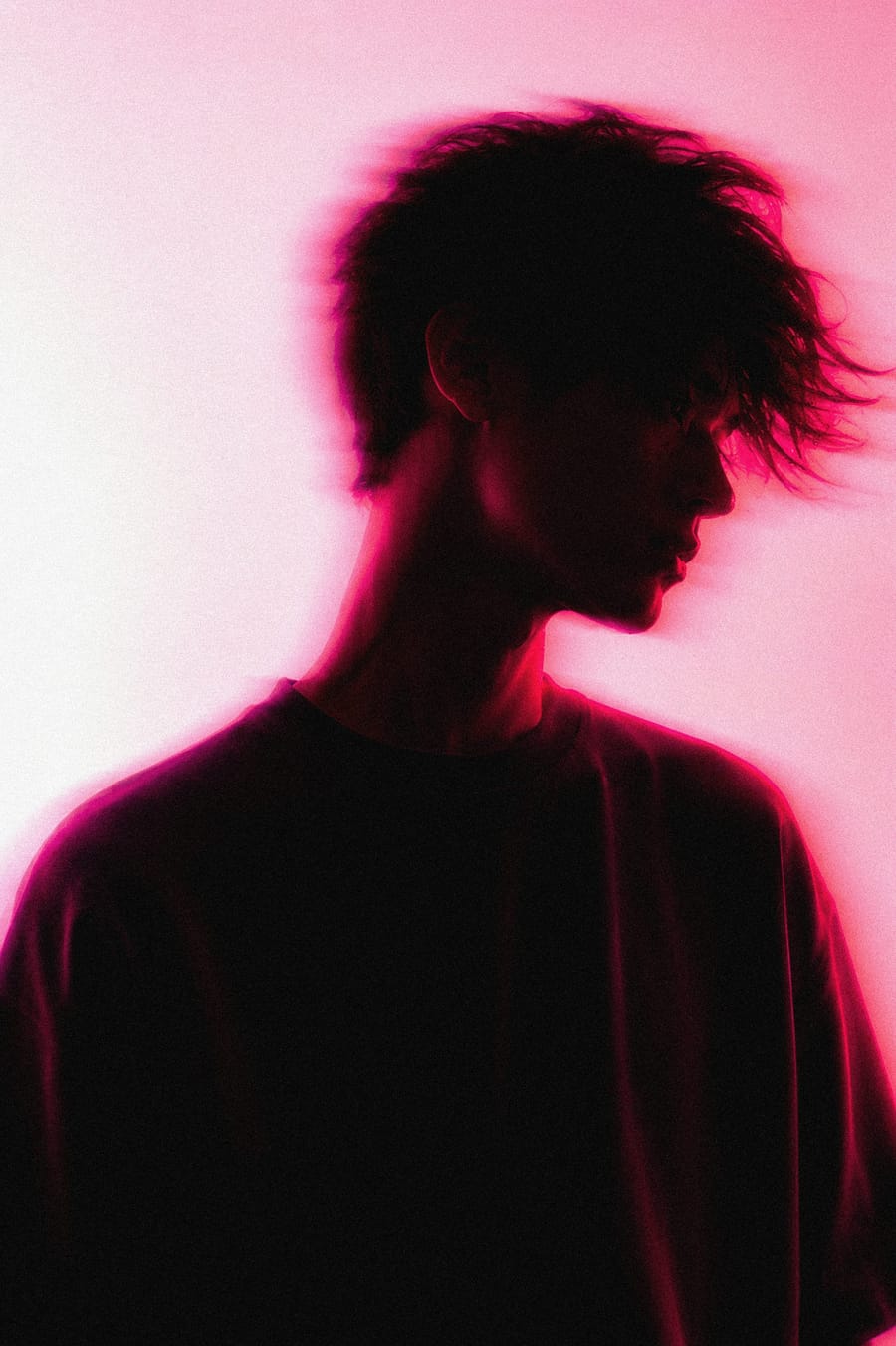 Neon Silhouette In Pink Glow
