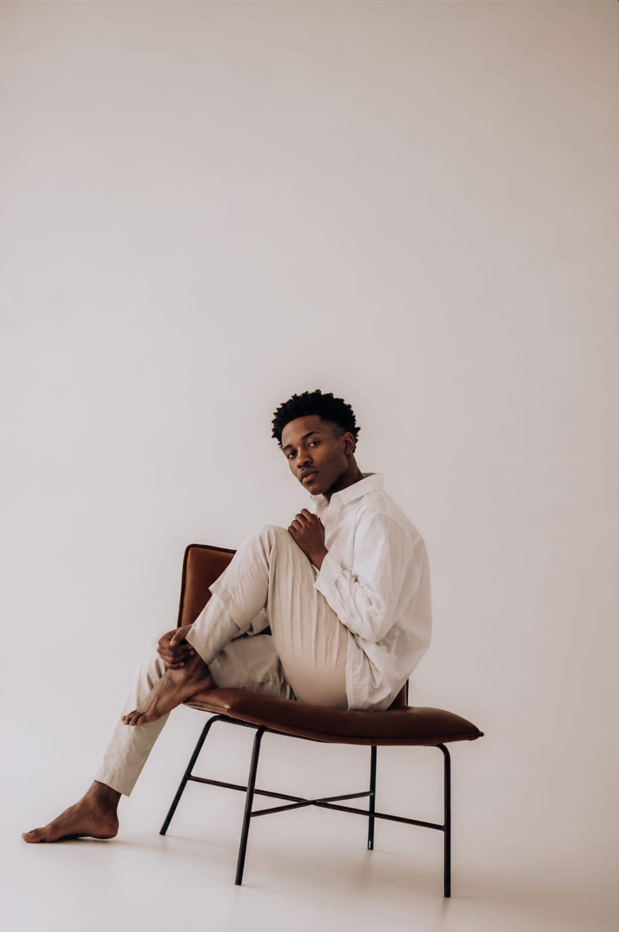 Contemplative Moment In A Minimalist Studio
