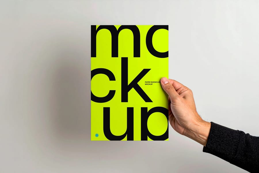 Hand Holding Paper Mockup