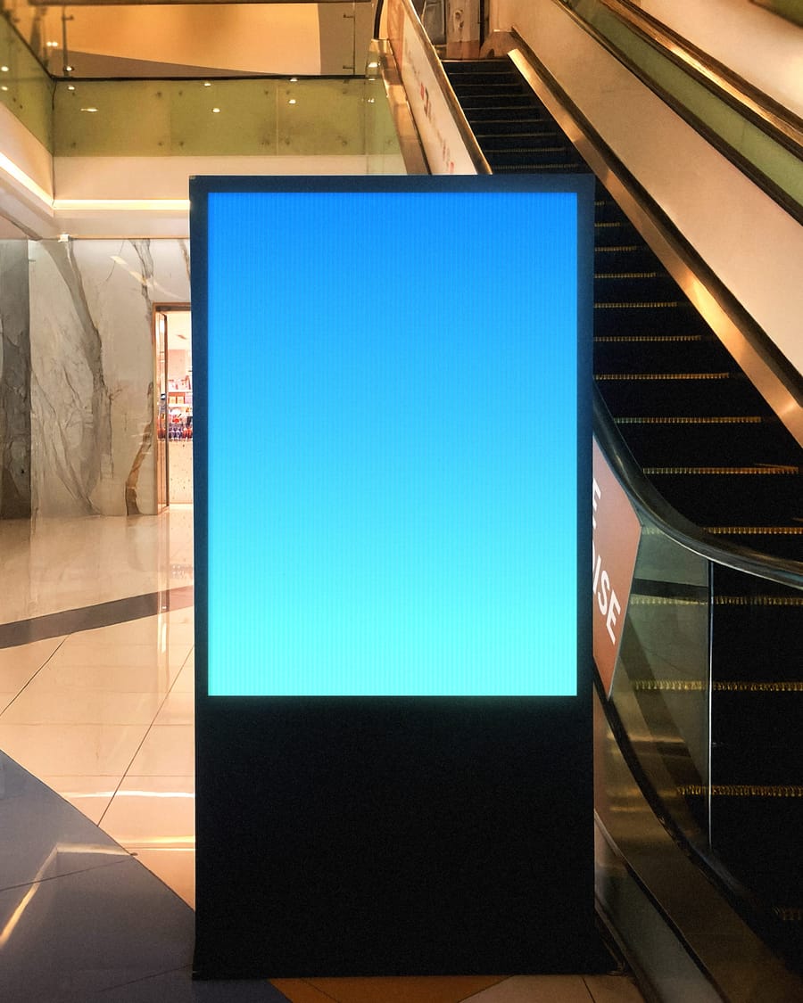 Standing Lightbox Billboard Mockup with Escalator Background